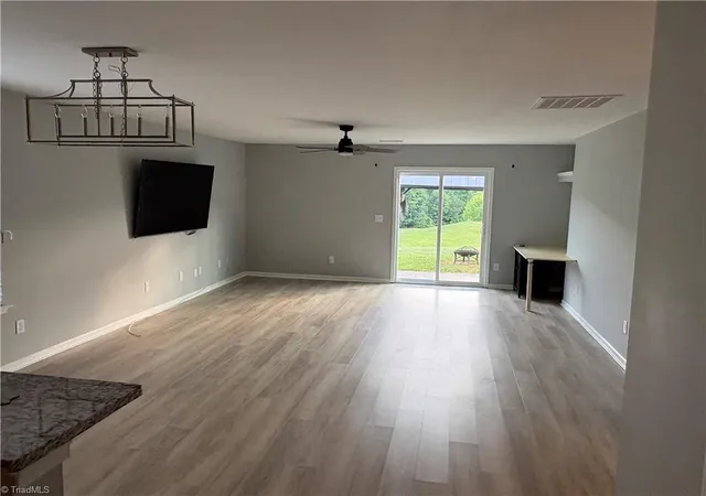 Photo 3 of Single family home for sale at 6612 Glenville Dr, Whitsett, NC 27377 | MLS# 1228058 | Listing updated on 2026-09-20