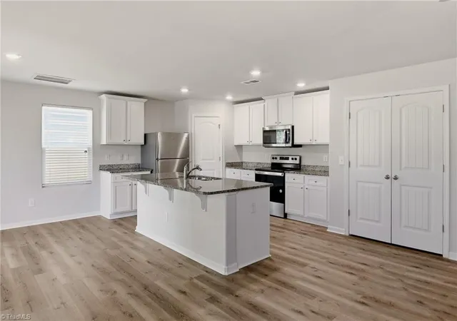 Photo 3 of Single family home for sale at 2106 Briar Run Dr, Greensboro, NC 27405 | MLS# 1229929 | Listing updated on 2026-09-09