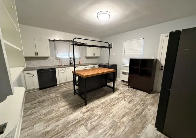 Photo 3 of Single family home for sale at 2313 N Glenn Ave, Winston Salem, NC 27105 | MLS# 1230428 | Listing updated on 2026-08-17