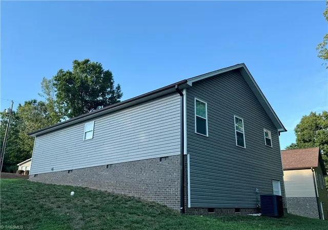 Photo 3 of Single family home for sale at 104 E Gene Hairston St, Madison, NC 27025 | MLS# 1233178 | Listing updated on 2026-08-26