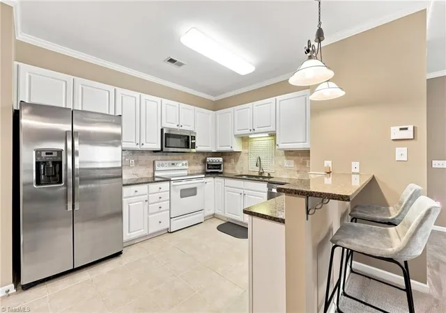 Photo 4 of Single family home for sale at 6941 Hanesbrook Cir #104, Clemmons, NC 27012 | MLS# 1233630 | Listing updated on 2026-09-02