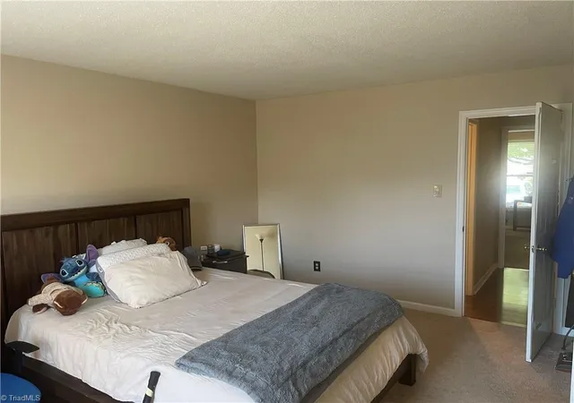 Photo 4 of Single family home for sale at 1303 Glen Raven Ct, Greensboro, NC 27410 | MLS# 1224349 | Listing updated on 2026-09-17
