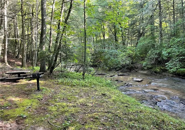Photo 3 of Land for sale at Tbd (lots 13 & 14) Timberwilde Dr, Laurel Springs, NC 28644 | MLS# 1216075 | Listing updated on 2026-08-13