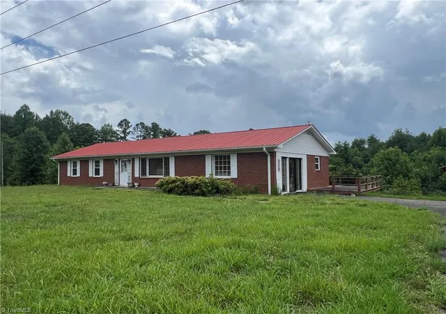 1st image of 310 Prison Camp Rd, Dobson, NC 27017 | MLS# 1228977