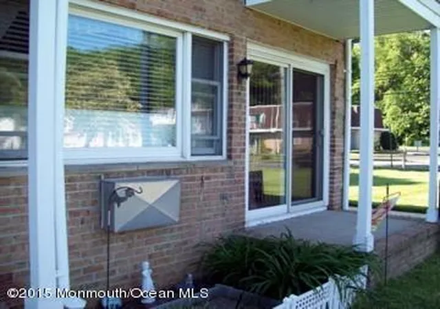 Listing Photo 1 - Condo for sale in building located at 324 Shore Dr, Highlands, NJ 07732 - Unit #A1