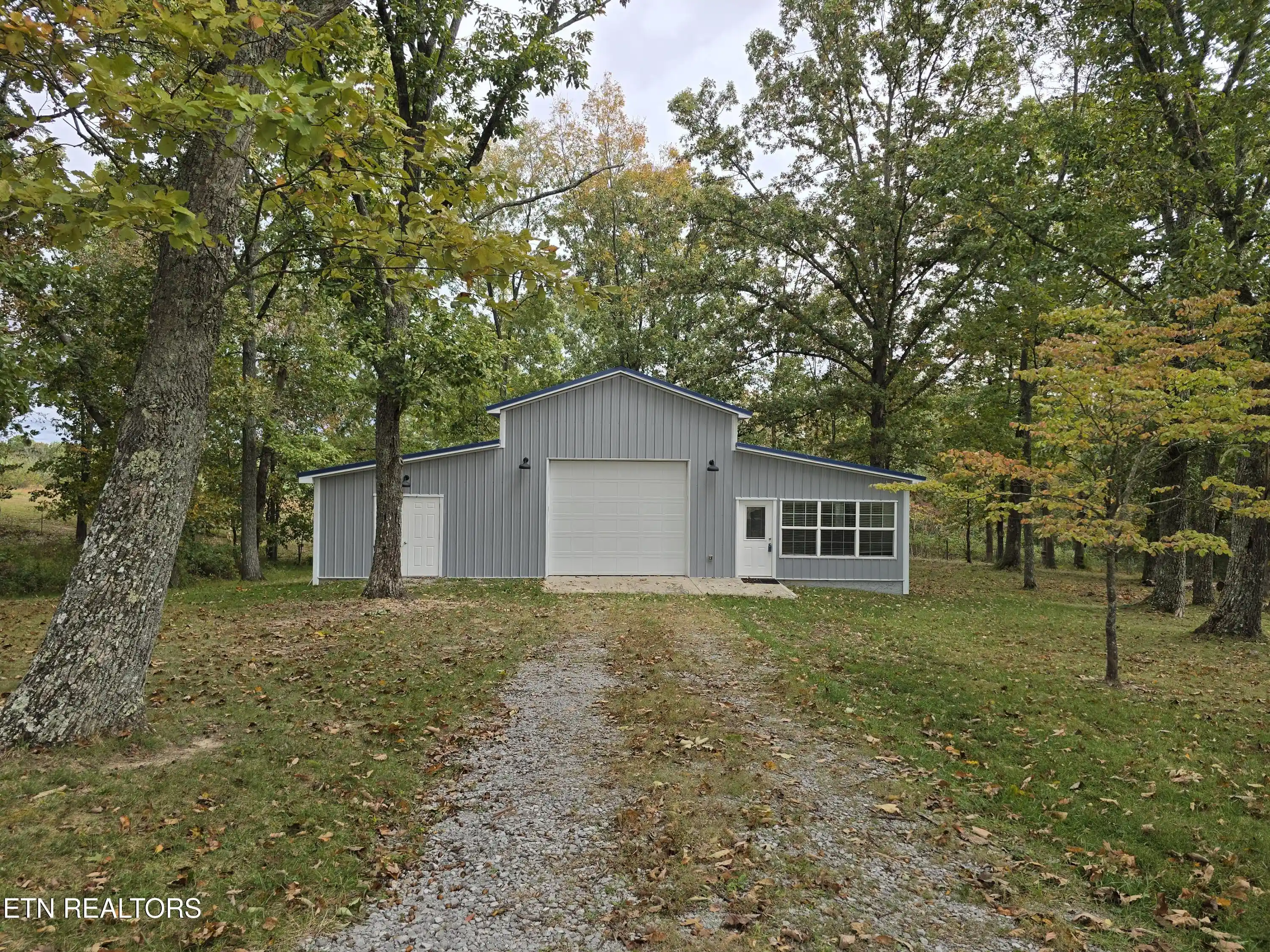 Photo 1 of Single family home for sale at 493 Woodgate Dr, Crossville, TN 38571 | MLS# 1359206 | Listing updated on 2026-10-28