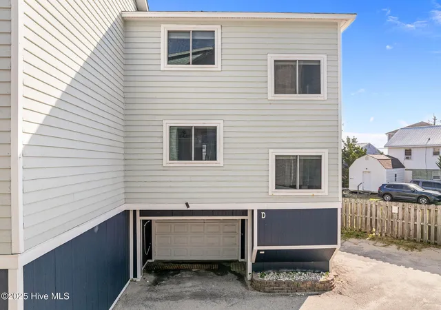 Listing Photo 1 - Condo for sale in building located at 1412 Canal Dr, Carolina Beach, NC 28428 - Unit #D