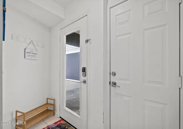 Listing Photo 5 - Condo for sale in building located at 1412 Canal Dr, Carolina Beach, NC 28428 - Unit #D