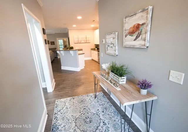 Listing Photo 2 - Condo for sale in building located at 7195 Bonaventure St SW, Ocean Isle Beach, NC 28469 - Unit #404