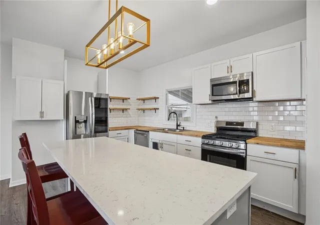 Photo 4 of Single family home for sale at 1030 Haslage Ave, Spring Hill, PA 15212 | MLS# 1762206 | Listing updated on 2026-09-20