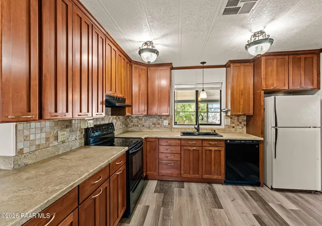 Photo 1 of Manufactured home for sale at 2069 W Smoketree Dr, Wickenburg, AZ 85390 | MLS# 1085353 | Listing updated on 2026-09-29