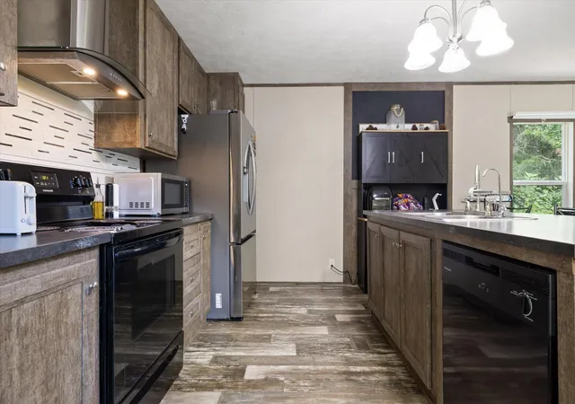 Photo 3 of Manufactured home for sale at 6183 Marie Ln, Harrison, TN 37341 | MLS# 3320957 | Listing updated on 2026-09-25