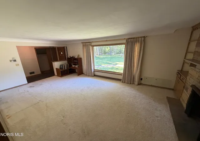 Photo 4 of Single family home for sale at 1001 Greenhills Rd, Toledo, OH 43607 | MLS# 10009491 | Listing updated on 2026-07-31
