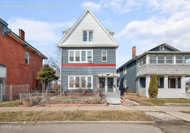 Photo 1 of Multi family home for sale at 1409 N Huron St, Toledo, OH 43604 | MLS# 10014212 | Listing updated on 2026-10-02