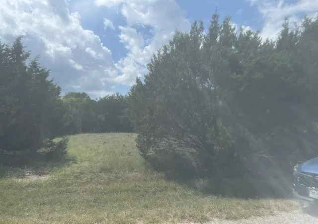 Photo 1 of Land for sale at 14048 Sandy Oaks Dr, Whitney, TX 76692 | MLS# 20679523 | Listing updated on 2026-07-10