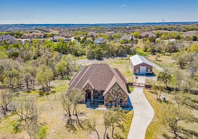 Photo 1 of Single family home for sale at 114 Woodlot Ln, Azle, TX 76020 | MLS# 20879151 | Listing updated on 2026-07-09