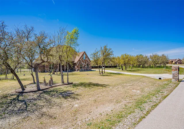 Single family home for sale at 114 Woodlot Ln, Azle, TX 76020 | MLS# 20879151 | Listing updated on 2026-10-08