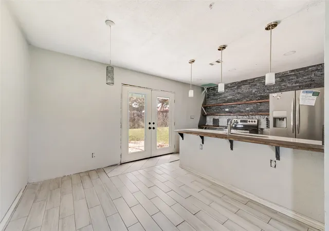 Photo 4 of Single family home for sale at 9502 Zelkova Cir, Dallas, TX 75249 | MLS# 21006365 | Listing updated on 2026-07-18