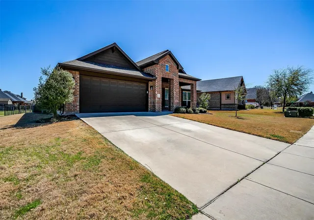 Photo 2 of Single family home for sale at 1023 Saint Andrews Dr, Burleson, TX 76028 | MLS# 21075193 | Listing updated on 2026-09-26