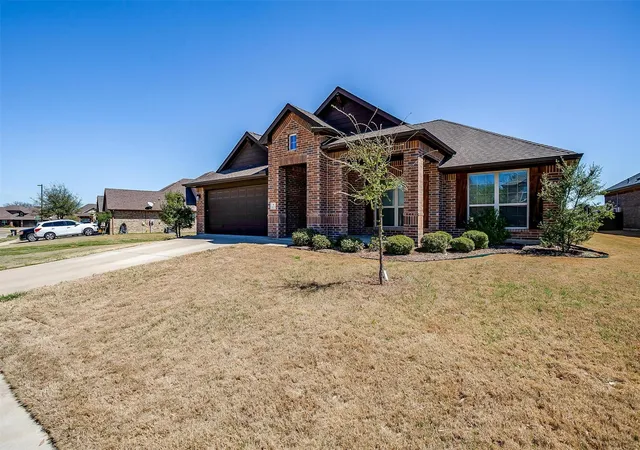 Photo 3 of Single family home for sale at 1023 Saint Andrews Dr, Burleson, TX 76028 | MLS# 21075193 | Listing updated on 2026-09-26