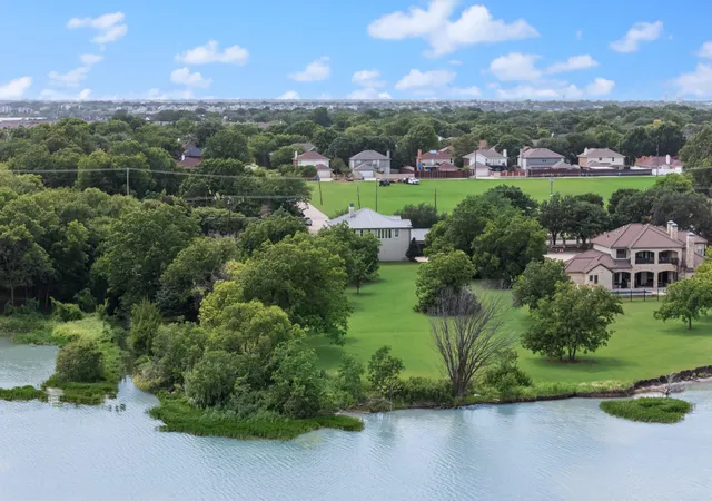 Photo 2 of Land for sale at 2106 Stone Hollow Dr, Rowlett, TX 75088 | MLS# 21098930 | Listing updated on 2026-08-11