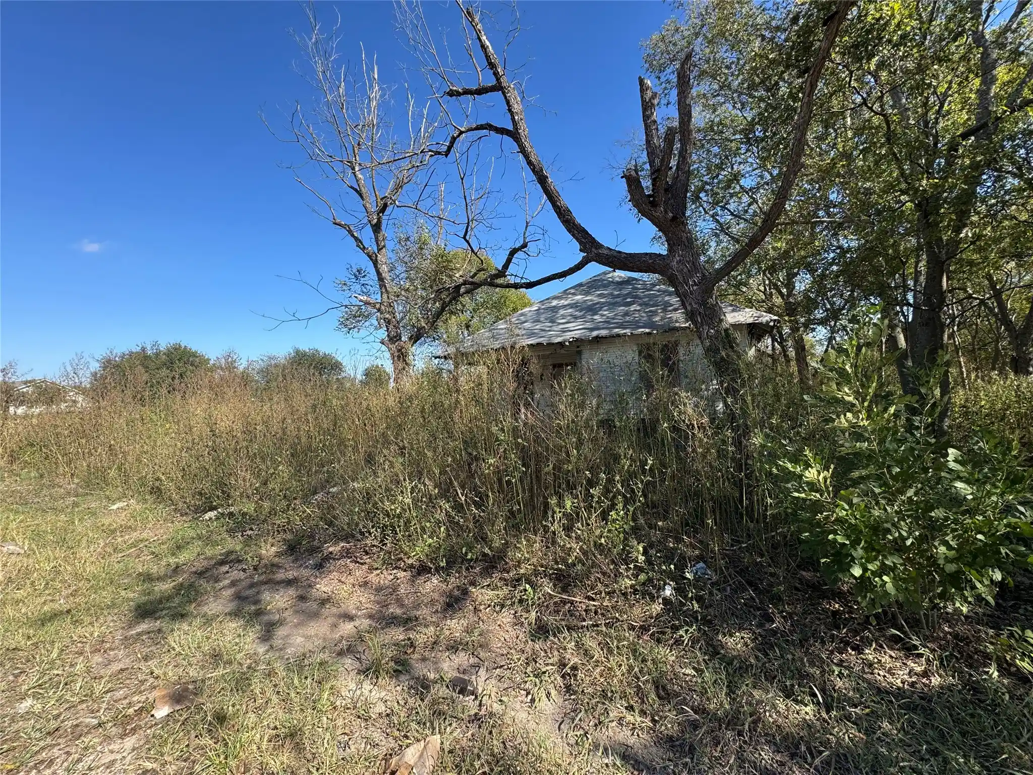Single family home for sale at 817 S Elm St, Mart, TX 76664 | MLS# 21092125