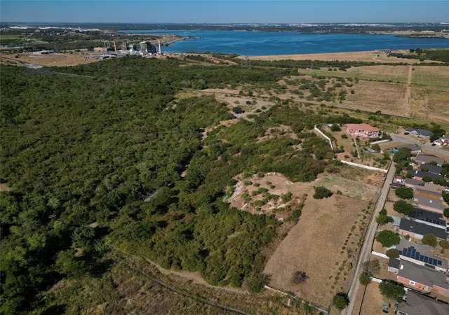 Photo 1 of Land for sale at 6165 Winonly Cir, Dallas, TX 75211 | MLS# 21121702 | Listing updated on 2026-03-23