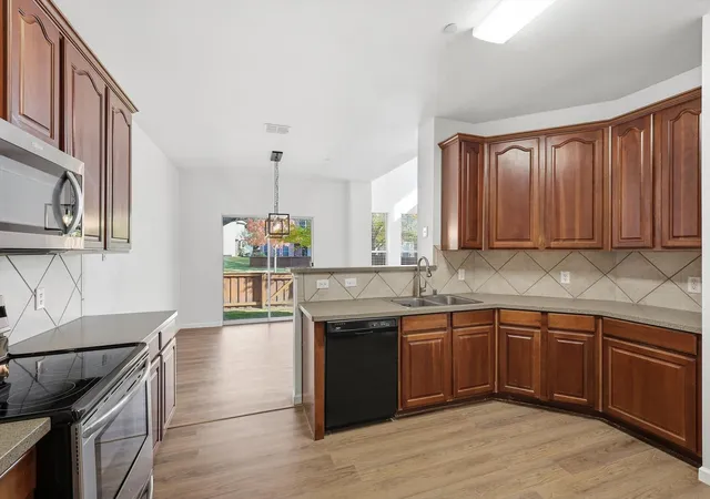 Photo 3 of Townhouse for sale at 2917 Saint Andrews Dr, Lewisville, TX 75067 | MLS# 21130643 | Listing updated on 2026-07-22