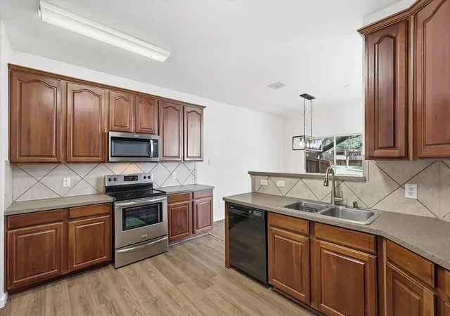 Photo 4 of Townhouse for sale at 2917 Saint Andrews Dr, Lewisville, TX 75067 | MLS# 21130643 | Listing updated on 2026-07-22