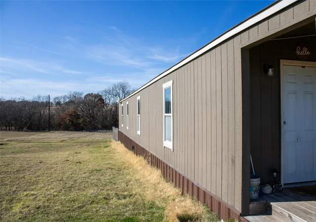 Photo 3 of Manufactured home for sale at 145 Firefly Dr, Springtown, TX 76082 | MLS# 21139406 | Listing updated on 2026-07-06