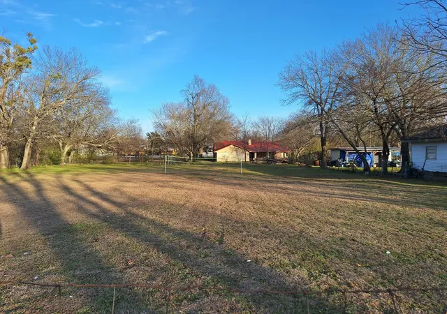 Photo 2 of Land for sale at 513 S San Antonio St, Wolfe City, TX 75496 | MLS# 21153490 | Listing updated on 2026-07-12
