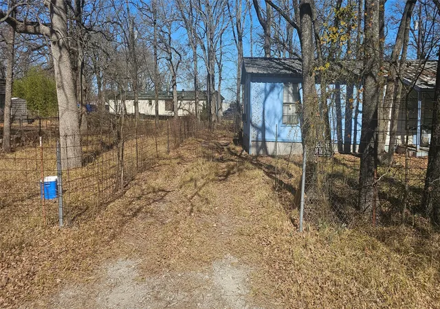 Photo 3 of Single family home for sale at 1932 Wahoo Ln, Quinlan, TX 75474 | MLS# 21172052 | Listing updated on 2026-07-22