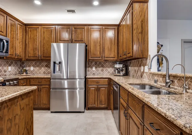 Photo 3 of Sale Pending at 2212 Paige Ct, Carrollton, TX 75006 | MLS# 21155231 | Listing updated on 2026-07-14