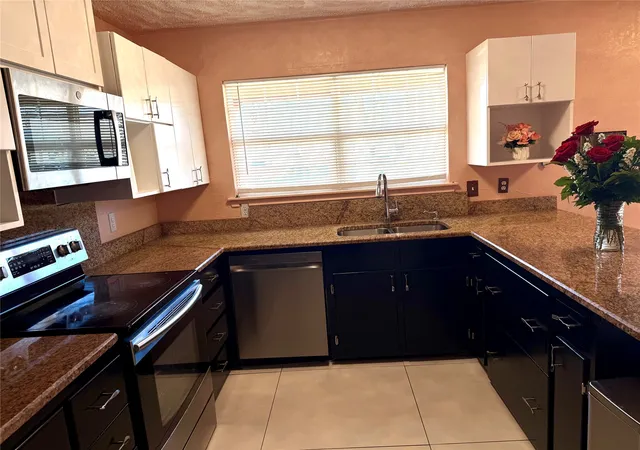 Photo 4 of Single family home for sale at 1410 Bowie St, Garland, TX 75042 | MLS# 21184286 | Listing updated on 2026-07-14