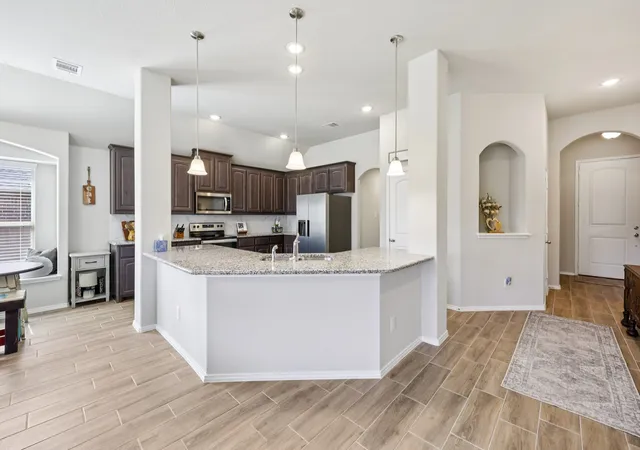 Photo 3 of Single family home for sale at 212 Magnolia Dr, Azle, TX 76020 | MLS# 21195685 | Listing updated on 2026-09-28