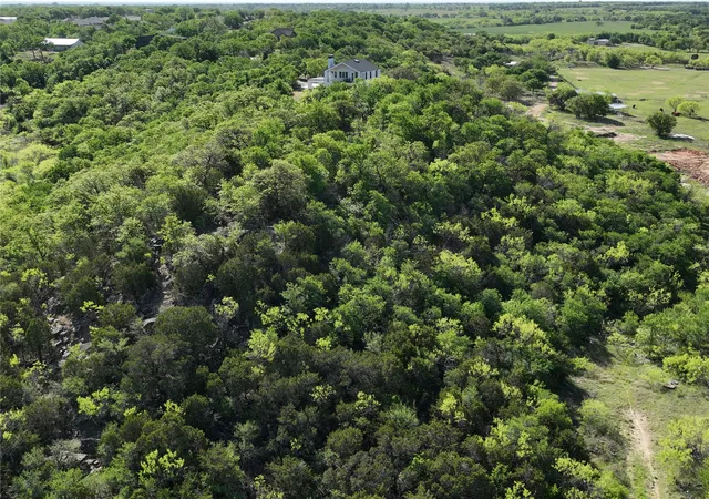 Photo 3 of Single family home for sale at 215 Lori Dr, Mineral Wells, TX 76067 | MLS# 21197825 | Listing updated on 2026-10-04