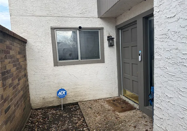 Photo 2 of Townhouse for sale at 9822 Amberton Pkwy, Dallas, TX 75243 | MLS# 21199926 | Listing updated on 2026-10-01