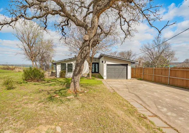 Photo 4 of Single family home for sale at 8245 Eagle Mountain Cir, Fort Worth, TX 76135 | MLS# 21197877 | Listing updated on 2026-10-01