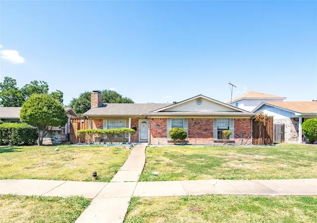 Photo 2 of Multi family home for sale at 1809 Crockett St, Garland, TX 75042 | MLS# 21201261 | Listing updated on 2026-07-10