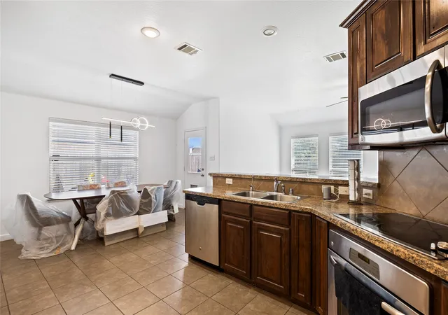 Photo 3 of Single family home for sale at 1048 Mercury Dr, Lavon, TX 75166 | MLS# 21209921 | Listing updated on 2026-08-24