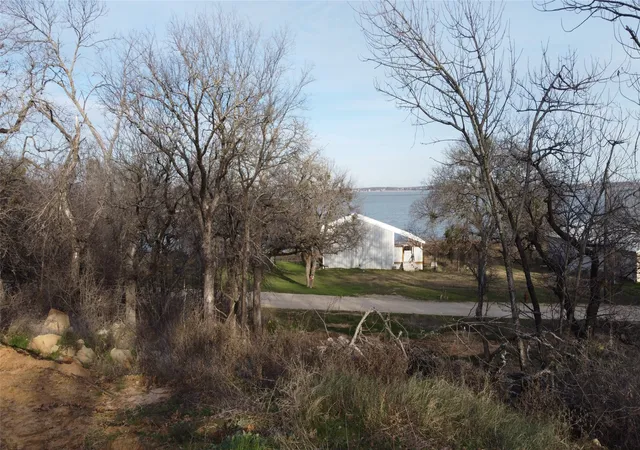 Photo 2 of Land for sale at 128 Meadow Pond Ct, Runaway Bay, TX 76426 | MLS# 21214258 | Listing updated on 2026-08-19