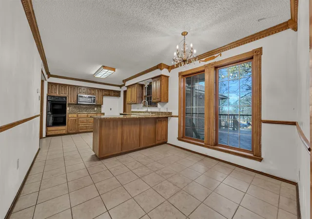 Photo 4 of Single family home for sale at 205 William Wallace Dr, Burleson, TX 76028 | MLS# 21213250 | Listing updated on 2026-09-18