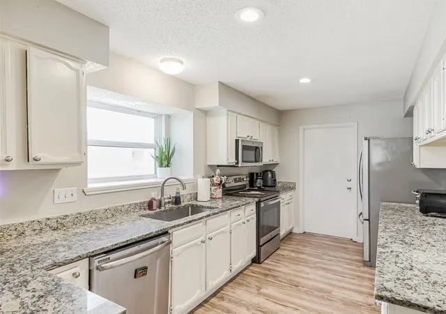 Photo 3 of Sale Pending at 317 Stillmeadow Dr, Garland, TX 75040 | MLS# 21202675 | Listing updated on 2026-09-04