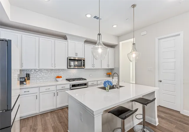 Photo 3 of Townhouse for sale at 300 Colusa St, Lewisville, TX 75056 | MLS# 21220832 | Listing updated on 2026-08-28