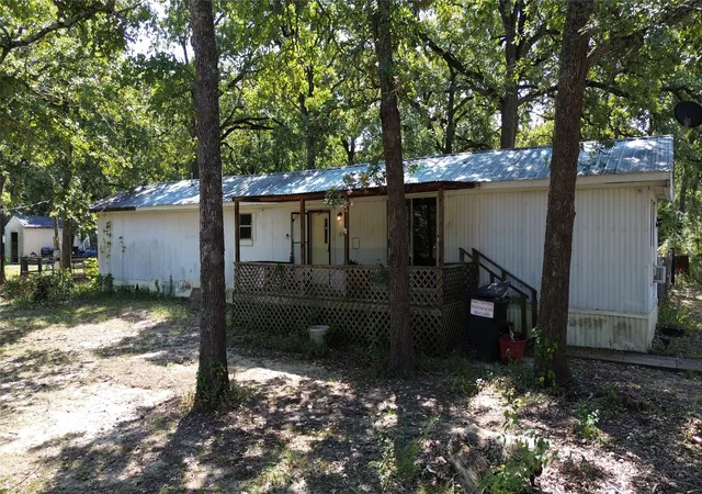 Photo 1 of Manufactured home for sale at 1957 Private Road 3836, Quinlan, TX 75474 | MLS# 21222172 | Listing updated on 2026-08-29