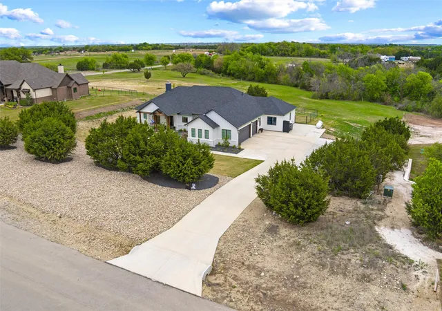 Photo 1 of Single family home for sale at 2043 Woodland Rd, Weatherford, TX 76088 | MLS# 21222634 | Listing updated on 2026-08-24