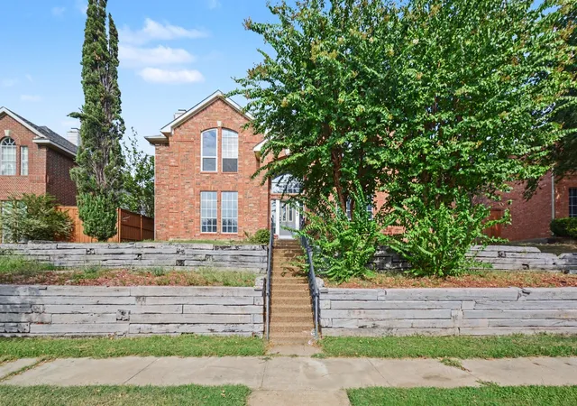 Photo 1 of Single family home for sale at 2406 Manchester Dr, Carrollton, TX 75006 | MLS# 21227985 | Listing updated on 2026-10-31