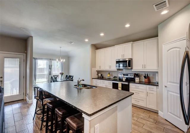 Photo 3 of Single family home for sale at 1408 Eagle Nest Dr, Azle, TX 76020 | MLS# 21232181 | Listing updated on 2026-07-06