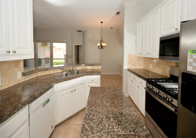 Photo 2 of Single family home for sale at 7410 Woodsprings Dr, Garland, TX 75044 | MLS# 21217137 | Listing updated on 2026-08-03