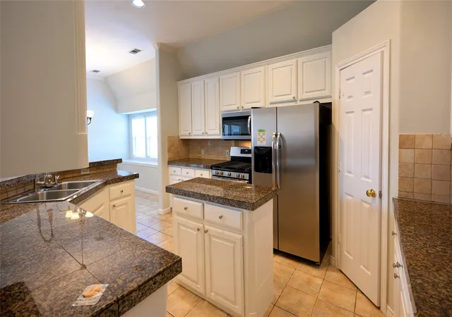 Photo 3 of Single family home for sale at 7410 Woodsprings Dr, Garland, TX 75044 | MLS# 21217137 | Listing updated on 2026-08-03